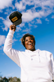 The Grove Conference Trucker Hat - passion resources