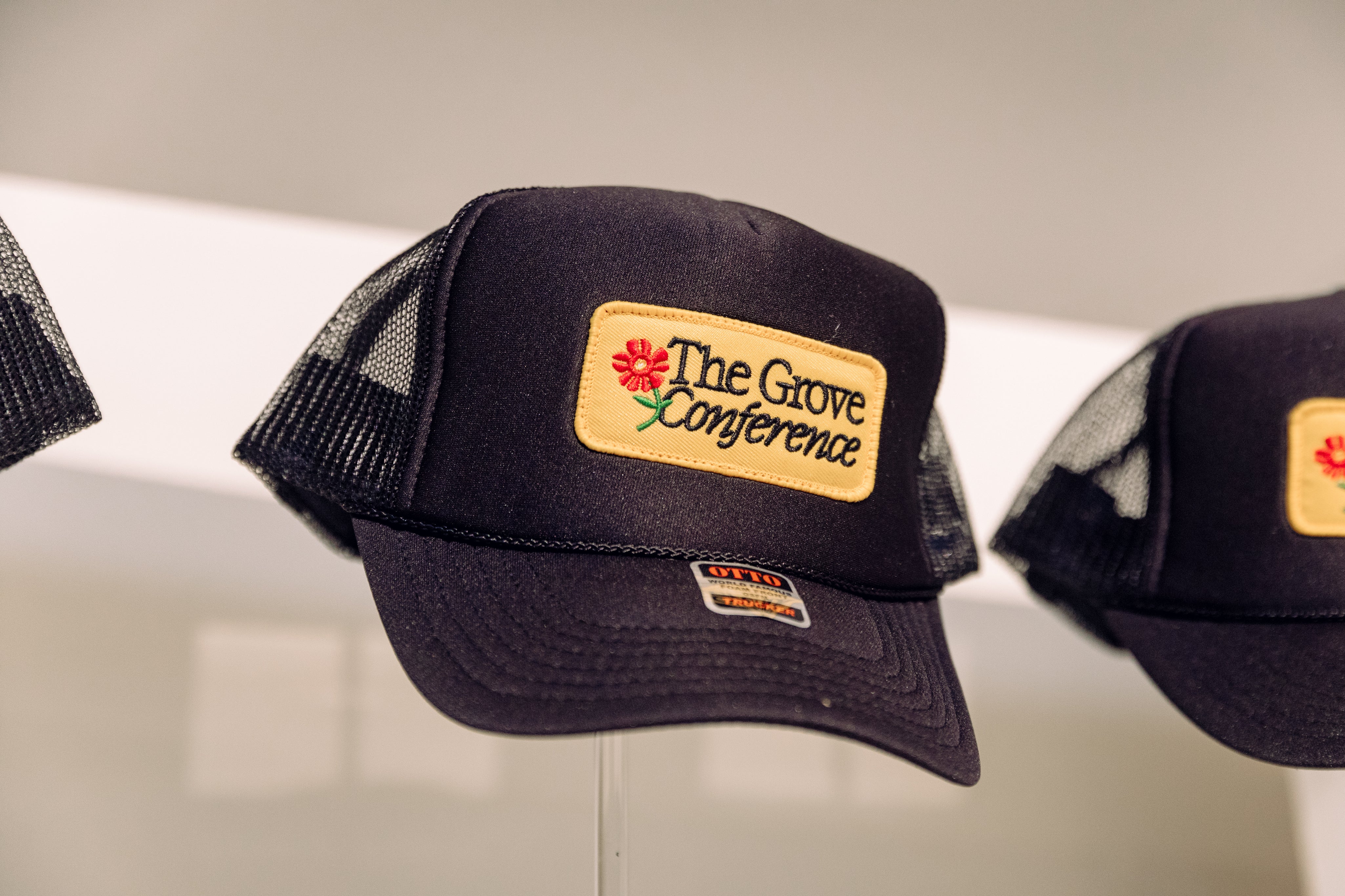 The Grove Conference Trucker Hat - passion resources